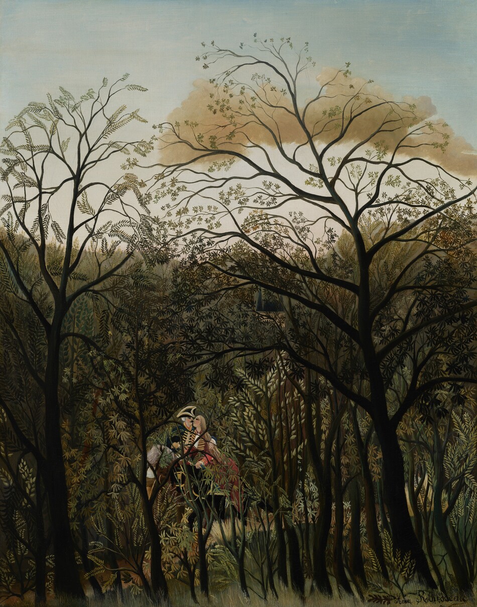 Beyond a dense screen of stylized, dark brown tree trunks, bending branches, and sage and moss-green leaves, a man and woman ride side-by-side on horseback and embrace in this vertical landscape painting. Both people have pale skin. Closest to us, two spindly trees almost reach the top edge of the canvas, their stylized leaves silhouetted against the sky. Trees and bushes with laurel and dark green leaves create a band across the foreground. Near the bottom center of the composition, the woman is closer to us but she turns her face to touch noses with the man riding next to her. Long, straight blond hair flows to her waist. She has pronounced, dark eyes under heavy brows, and a large nose. She wears a burgundy-red jacket with horizontal, gold stripes across the chest. A white shirt beneath shows through where the jacket gapes open at the chest and at her cuffs. She holds the reins of her black horse in her left hand. The man turns his torso toward the woman and wraps his left arm, to our right, around the woman’s shoulders. He looks at her with black eyes under dark brows. He has a black, handlebar mustache and white hair. He wears a black and gold three-corner hat and a navy-blue jacket with gold braid in front and around the neck. His horse is brown with a silvery-white mane. Behind the people, the forest comes about two-thirds of the way up the composition. One tan-brown cloud hangs in the sky that lightens from seafoam green along the top edge to oyster white along the horizon. The artist signed the painting in the lower right: “Henri Rousseau.”