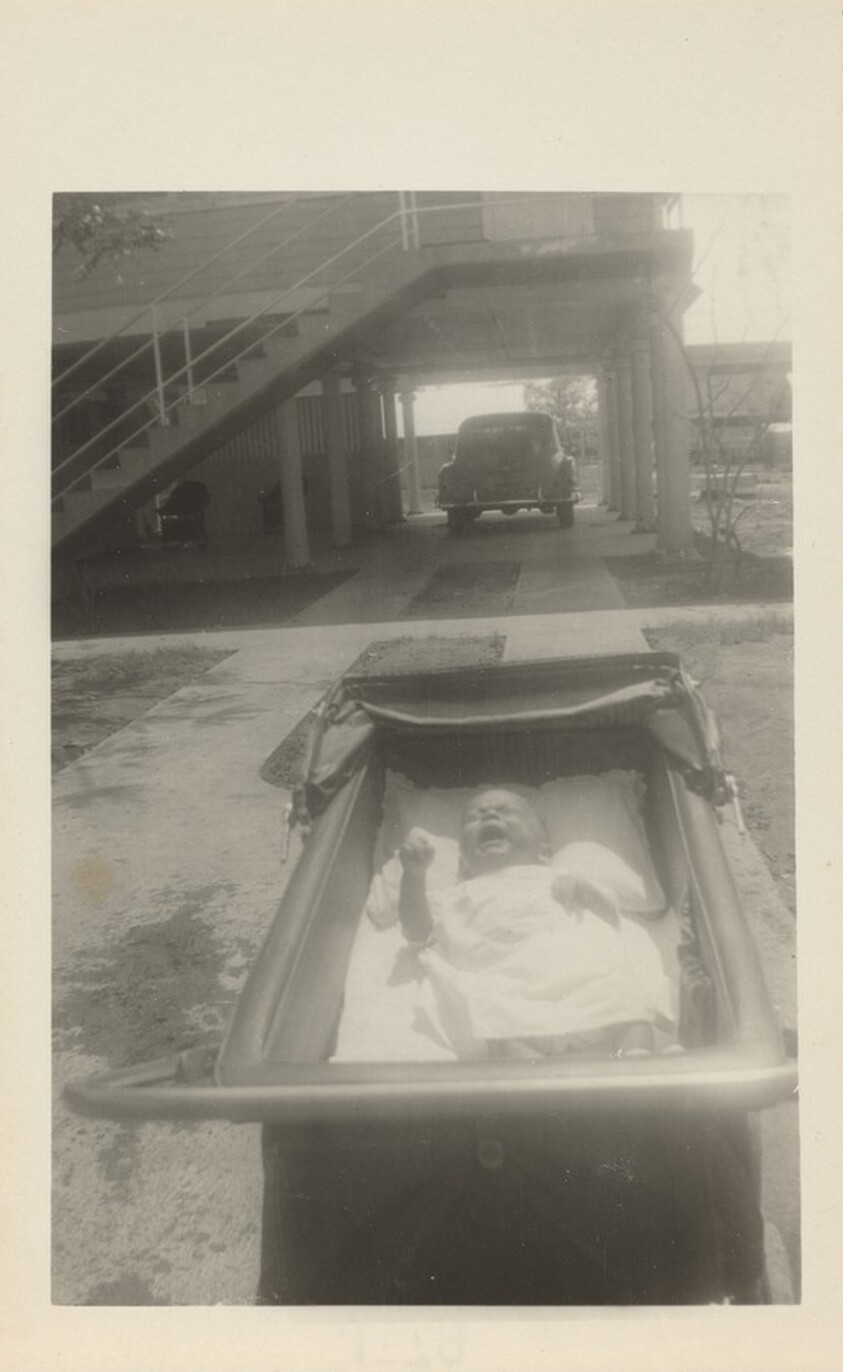 Untitled (Baby crying in carriage)