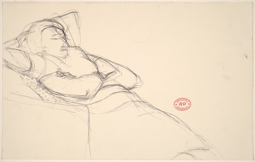 Untitled [woman reclining in a seat]