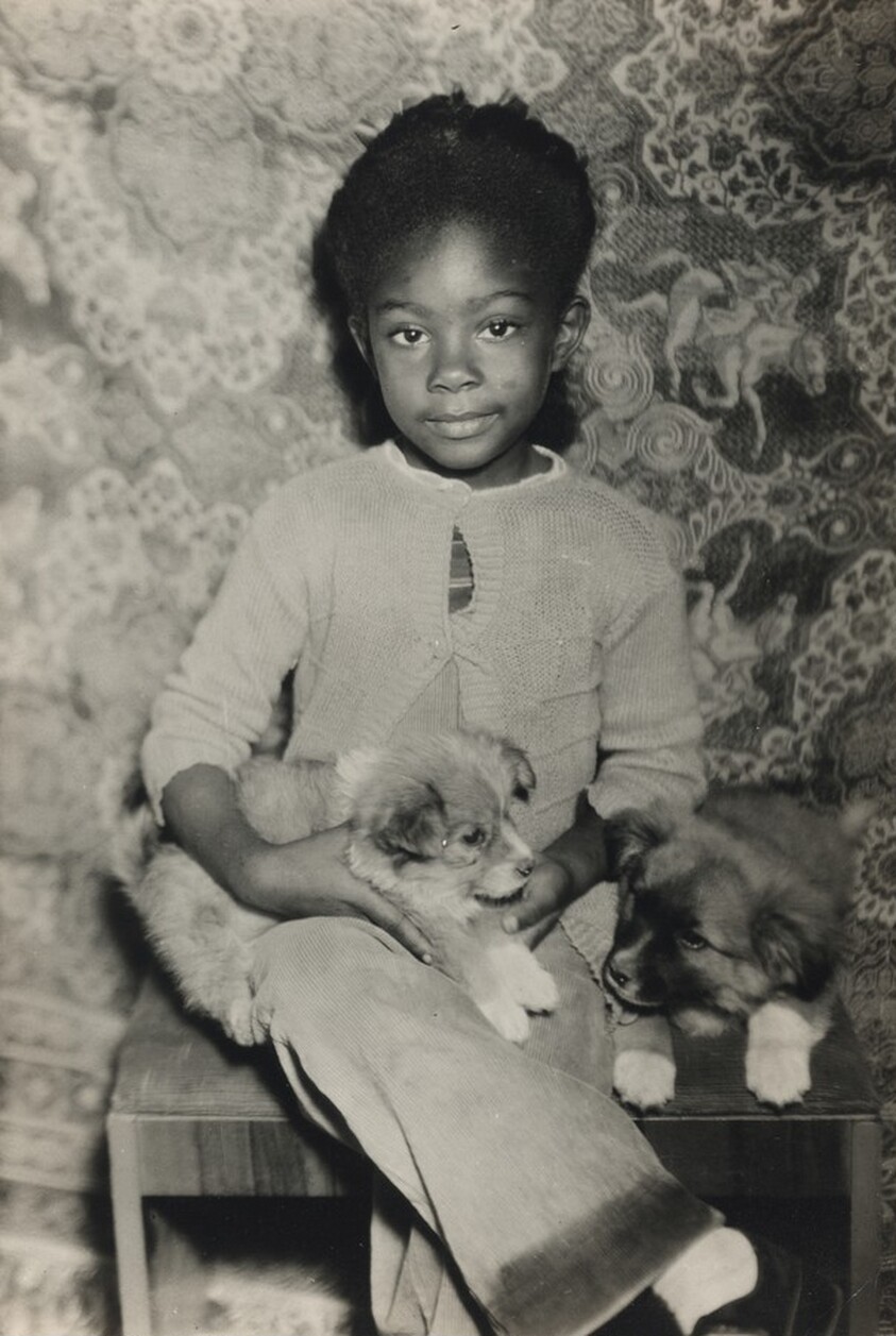 Untitled (Girl holding two dogs)