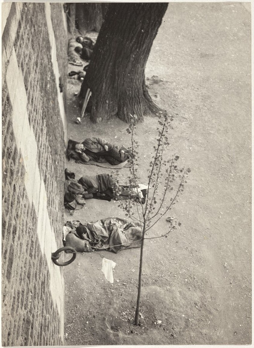 Men sleeping outdoors