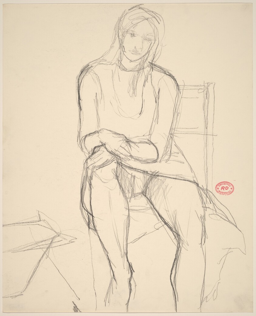 Untitled [seated woman in a dress]