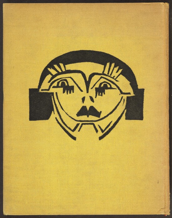 The image shows bold black lines and shapes on a yellow background. The central figure has eye shapes, a nose, and geometric mouth shapes. The surrounding black shapes suggest hair or a headdress, contributing to the abstract representation of a head or mask-like figure.