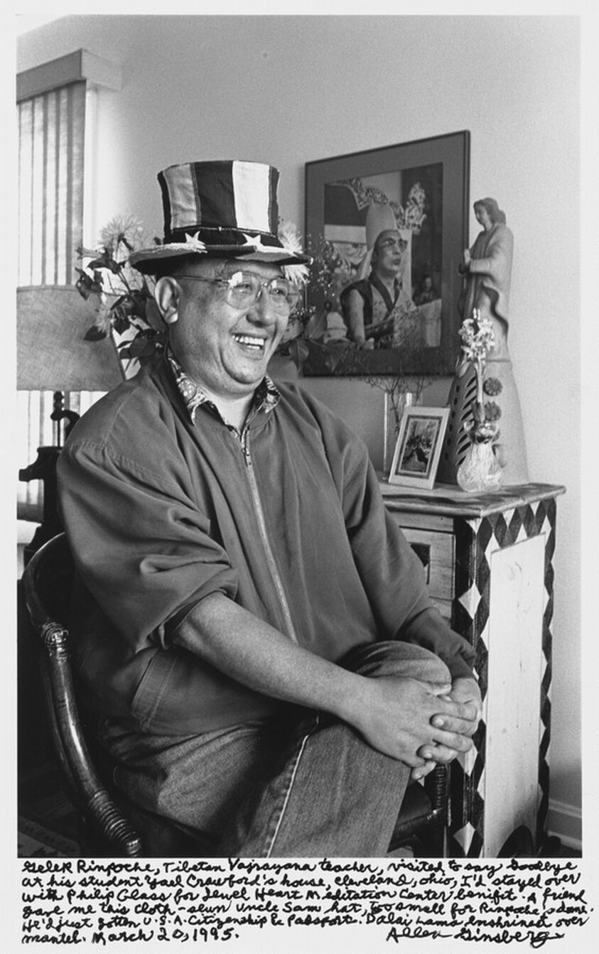 Gelek Rimpoche, Tibetan Vajrayana teacher, visited to say Goodbye at his student Yael Crawford's house, Cleveland, Ohio, I'd stayed over with Philip Glass for Jewel Heart Meditation Center benefit. A Friend gave me this cloth-sewn Uncle Sam hat, too small for Rimpoche's dome. He'd just gotten U.S.A. citizenship & passport. Dalai Lama enshrined over mantel. March 20, 1995.