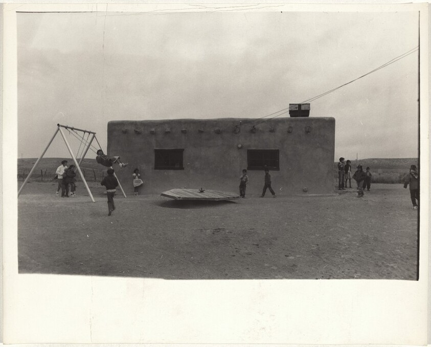Adobe school with children in playground--Santa Fe or Taos, New Mexico