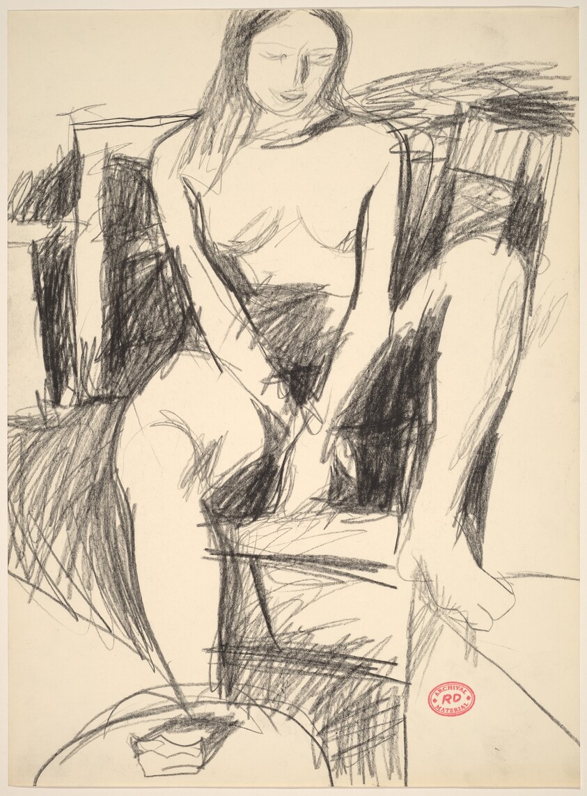 Untitled [seated female nude with left foot resting on stand]