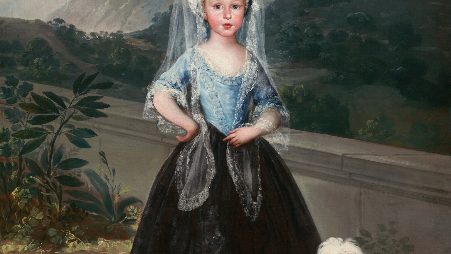 A young girl with pale skin, rosy cheeks, and blond hair stands facing us in front of a landscape with forests and mountains in this vertical portrait painting. The girl looks at us with wide, gray eyes under delicately arched eyebrows. She has a short, rounded nose, and her full, pink lips are parted. Her smooth, rounded cheeks are flushed. She wears a lace-trimmed, sky-blue, scoop-necked bodice that comes to a V at her waist, a full, ankle-length black skirt, and a white bonnet with a royal-blue ribbon, which has a pink rose at the bow. Her long, white, lacy veil, called a mantilla, drapes over the hat, over her shoulders, and to her waist. One end of the mantilla drapes over her left wrist, to our right. The other end is pinned under the back of her other hand, which rests against that hip. One cobalt-blue, pointed shoe with a silver buckle peeks out under her skirt. A small, shaggy, white-haired dog sits at her feet to our right. A low, gray stone wall behind the girl and dog angles away from us to the left. Some plants with dark green leaves grow in front of the wall to our left. Beyond the wall, pine-green, treed foothills rise to meet rocky, nickel-gray mountains under a ice-blue sky with pale, petal-pink clouds kicking up over the mountains. An inscription in all capital letters is painted in black in the lower left corner: “LA S.D. MARIA TERESA HIXA DEL SER. INFANTE D. LUIS DE EDAD DE DOS ANOS Y NUEVE MESES.” A crimson-red letter “B.” is painted to the left nearby. In the lower right corner, the number “15.” is painted in white and the number “5.” is painted in red.