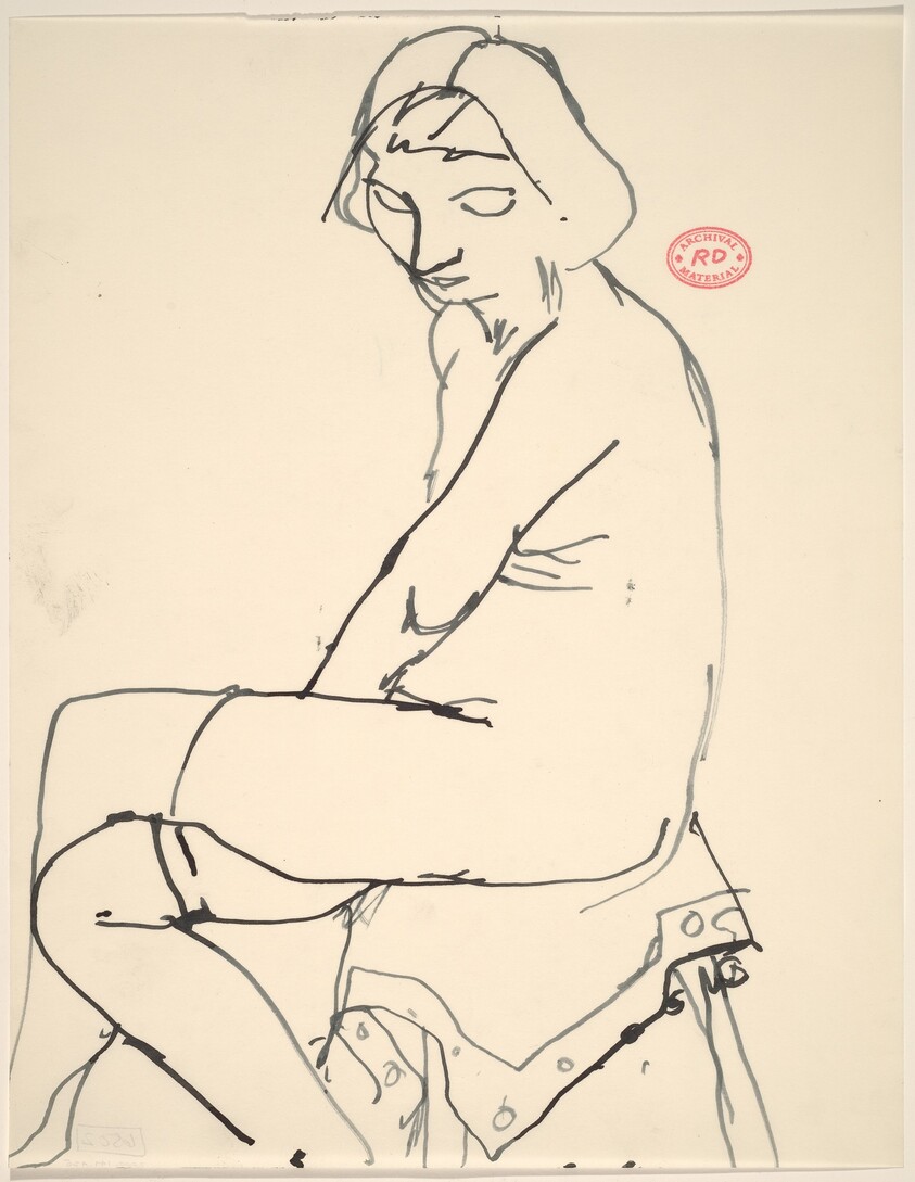 Untitled [seated female nude in stockings with crossed legs]