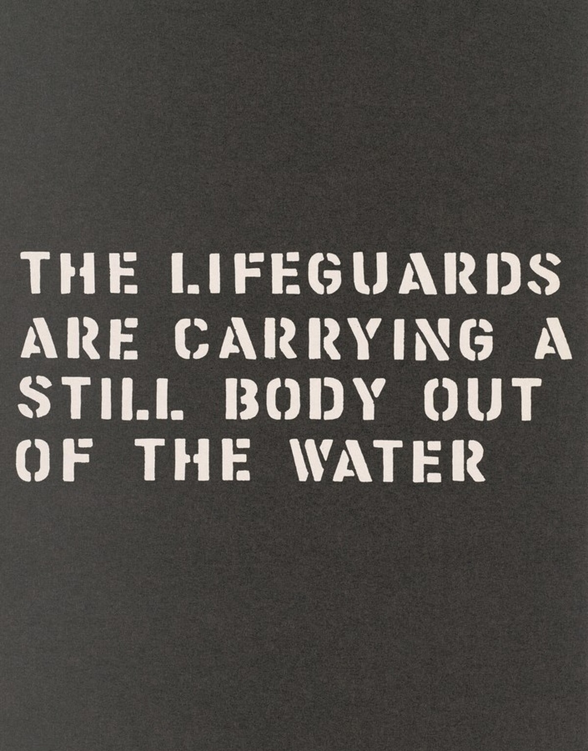 A Performance:The Lifeguards Are Carrying a Still Body Out of the Water