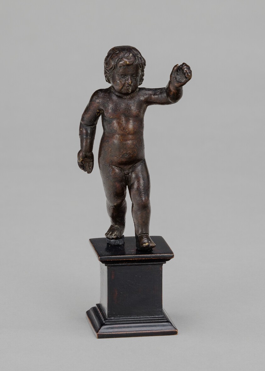 Standing Child with Raised Left Arm