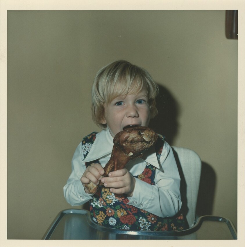 Untitled (Boy with piece of meat)