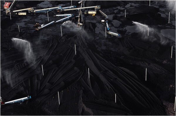 Petcoke piles in southeast Chicago at Koch Industries site along the Calumet River, November