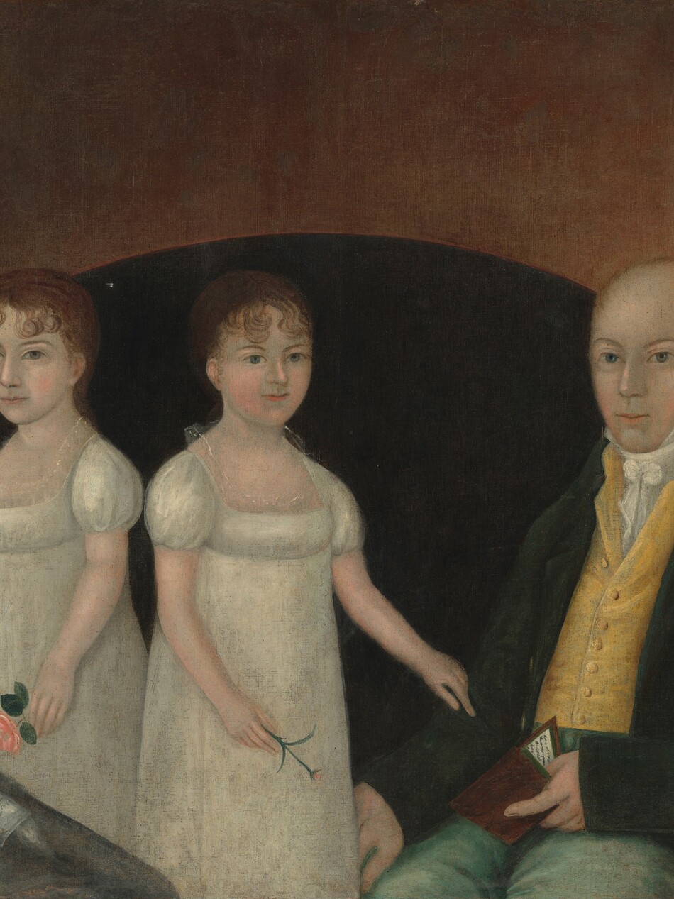 This painting looks like a family portrait with five people: two seated adults and three children. The person on the far left is a seated woman with dark hair styled up and short, curling bangs, wearing a gray dress with puffed sleeves and lace details at the neckline. She holds a folded piece of paper in her lap and has one arm around the girl next to her. On her right stand two young girls with curly reddish-brown hair tied back, both dressed in white dresses with puffed sleeves and lace around the necklines. The girl to the left holds a pink flower, while the other holds a small pink bud. On their right is a seated man with short reddish-brown hair, wearing a dark jacket over a yellow vest and a white cravat and green trousers, holding a small book partially open. Standing to the right, partially behind the man, is a young boy dressed in a green coat with gold buttons over a pink vest and white shirt. All five of the people have pale skin. Behind the family is a black semi-circle, and around that is a gradient of brown, darker at the top and lighter towards the bottom.