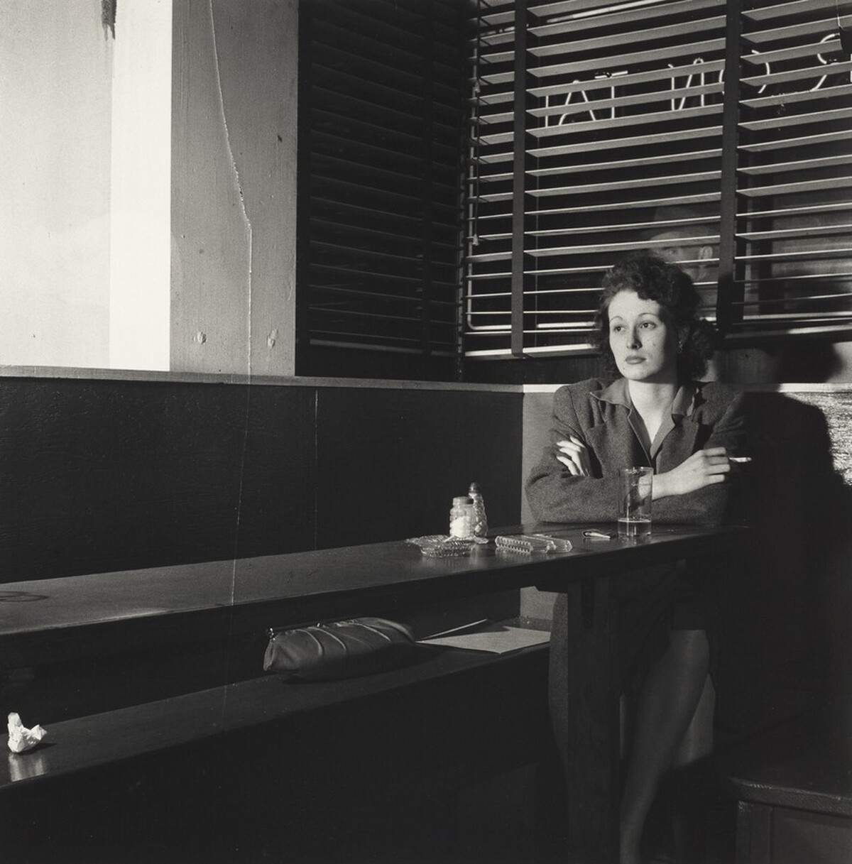 Girl Sitting Alone in the 'Sea Grill,' a Bar and Restaurant, Waiting for a Pick-up, Washington, D.C.