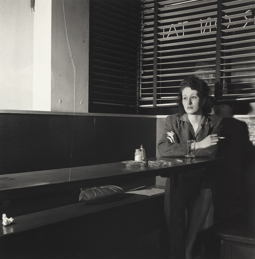 Girl Sitting Alone in the 'Sea Grill,' a Bar and Restaurant, Waiting for a Pick-up, Washington, D.C.