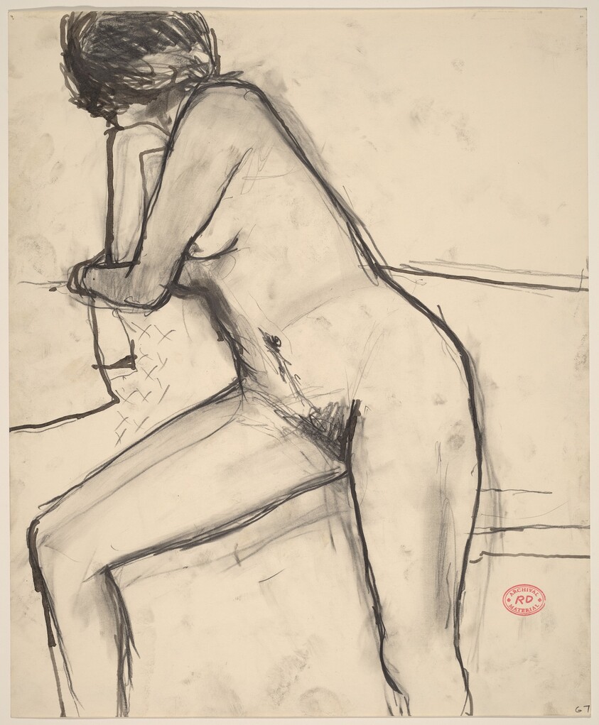 Untitled [female nude leaning against a support]