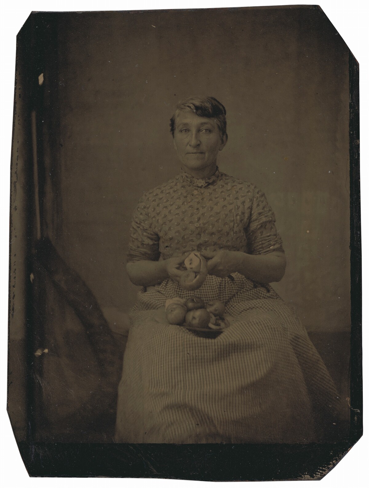 Portrait of a Woman Peeling Apples