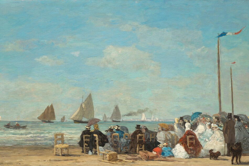 About two dozen men and women sit in straight-backed, wooden chairs gathered along a sandy beach near low, gently breaking waves with sailboats floating in the ocean beyond in this horizontal landscape painting. The scene is loosely painted throughout, making much of the detail indistinct. Most of the people sit with their backs to us but the faces we can see suggest they all have light skin. The people gather in a loose crowd that crosses the right two-thirds of the composition. The women wear long dresses with full skirts, their shoulders wrapped in matching shawls in black, smoke gray, royal or arctic blue, rust red, or cream white. Some wear straw-colored hats with black or baby-blue bands, and others wear scarves over their hair. The men also wear hats, most of them black top hats, and suits in black or pecan brown. Some people hold up parasols in harvest gold, slate blue, teal, or gray. A few straight-backed, wooden chairs with rushed seats sit empty or are tipped over to our left of the group. Two children, one wearing marigold orange and the other topaz blue, and both wearing straw hats, kneel or squat and bend over the sand at the center of the group. Two dark brown or black dogs, one small and one large, stand to our right. Two tall, wooden poles rise high above the crowd near the right edge of the composition. A thin banner with blue, white, and red stripes flutters from the pole closer to us, and a red banner lifts in the breeze on the one farther away. Painted with thick, visible brushstrokes, low waves with white crests lap against the shore in bands of pale lilac purple, light turquoise, and aquamarine blue just beyond the crowd. Two people sit in a rowboat in the ocean to our left, and several sailboats with tan sails move into the distance to the horizon, which comes about a quarter of the way up the composition. Bright white strokes to our right could be sails in bright sunlight, deep in the distance. One boat amid the sailboats puffs a plume of gray smoke. Pale, almost translucent white clouds drift across the light blue sky above. The artist signed and dated the painting in the lower left corner: “E. Boudin 63.”