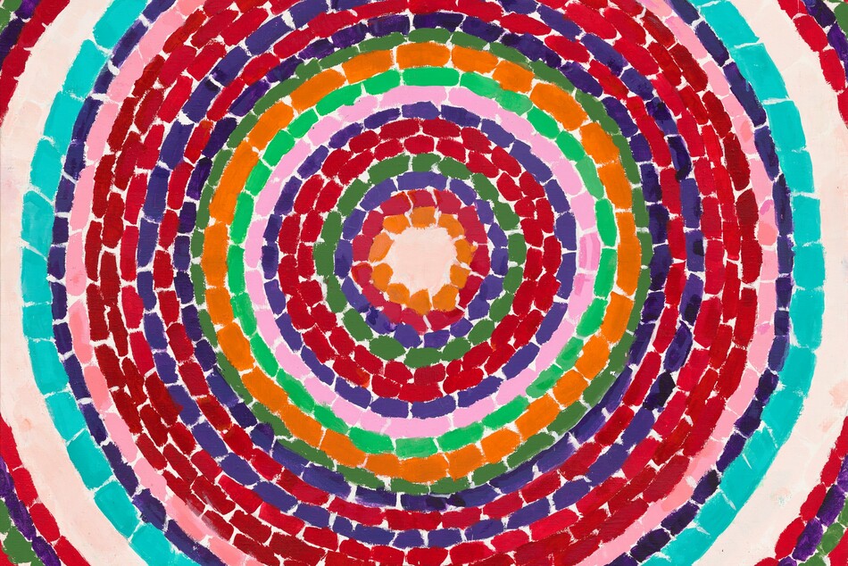This nearly square, abstract painting is filled with circles within circles, like nested rings, each of a single bright color against the ivory white of the canvas. Each ring is made up of a series of short, rectangular dashes, and some bands are narrower while others are a bit wider. The majority of the rings are crimson and brick red, and they are interspersed with bands of lapis blue, army green, and pale pink. One of two pumpkin-orange bands is the smallest, innermost ring at the center. There is one aqua-blue colored ring just inside a pale, shell-white ring, which is the first to get cropped by the edges of the canvas. A few red, green, and blue rings beyond the white band are only seen at the corners of the canvas.