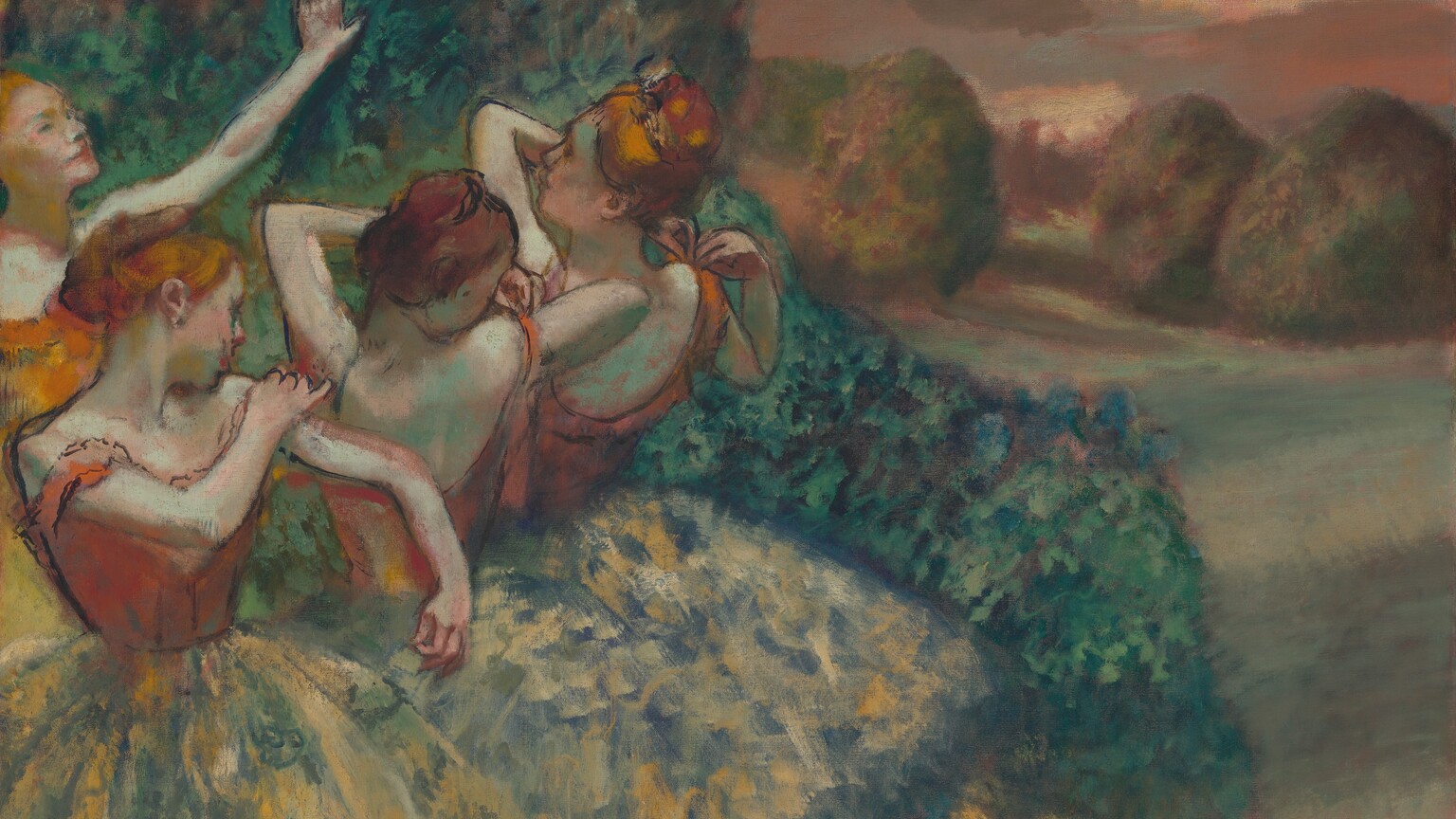 Four light-skinned ballerinas with russet-orange hair tied back in buns adjust the straps of their bodices as they gather close together, their bodies and wide, knee-length tutus taking up the left half of this horizontal painting. The background or backdrop beyond them shows a grove of deep green trees to our left and a sunset view of meadows leading back to trees to our right. Three of the dancers stand in a row that extends from the lower left corner to our right and away from us. All three wear rust-orange bodices over tutus that are painted loosely with flecks of pale celery green and buttercup yellow against a muted royal-blue background. Their bodices and upper bodies are outlined with black. The woman closest to us stands with her body angled to our right. Her face turns away as she looks to her left and adjusts that shoulder strap. The two dancers farther from us stand with their backs to us, their bodies angled away from us to our left. The middle dancer looks back over her right shoulder as she lifts the other elbow to adjust that strap. The third dancer in the row holds both hands to her right strap as she looks off into the distance, to our left. The fourth ballerina, to our far left beyond this trio, stands with the arm we can see, her left, lifted with her hand held high as she looks off to our right. Her bodice is a brighter carrot orange, and is more loosely painted. The green foliage behind the dancers extends off the top edge of the painting. The pale sage-green field to the right stretches before puffy, rounded trees daubed with mauve-pink highlights. The coral-pink and golden yellow sky is streaked with lavender-gray clouds. The artist signed his name in red paint with tiny, almost illegible letters in the lower right corner, “Degas.”