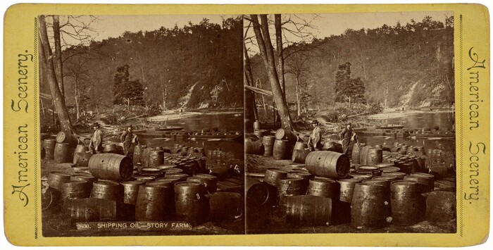 The image shows a stereoscopic view of men around wooden barrels at an oil-shipping operation. There is a small river with trees alongside, leading to a hilly landscape in the background. The scene is in sepia tone with a range of brown and tan colors.