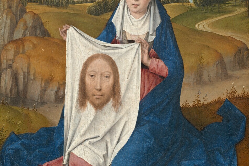 A woman sitting close to us in front of a deep landscape holds up a white cloth with the image of a man’s face on it in this vertical painting. The woman and the image on the cloth both have pale skin, hooded eyes, and long, straight noses.  The woman’s shoulders are squared toward us, and her legs are tucked under her. Her head tips slightly to our right. Her eyes are downcast, and her bow-shaped lips are parted. She wears a white, turban-like headdress with a white veil covering her neck and upper chest. Her rose-pink dress is mostly covered by a voluminous, lapis-blue robe falling from the back of the headdress to the ground, where it puddles in angular folds. On the white cloth she holds up, the man’s head has chin-length blond hair and a beard. He looks out at us with light brown eyes. The woman sits on a grassy field. A dirt path cuts through a shallow valley across the picture, not far behind the woman. More harvest-yellow and moss-green hills roll back to a town with gray stone buildings with blue roofs along the horizon, which comes three-quarters of the way up the composition. The sky above deepens from white at the horizon to azure blue across the top of the painting.