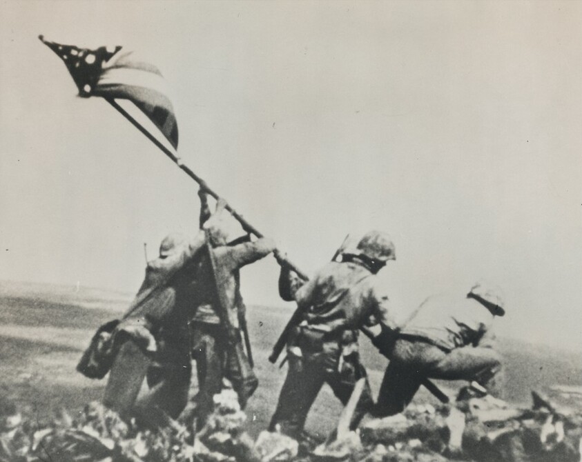 Title from caption on object: "Marine Who Made Movie of Famous Iwo Jima Flag Raising Dies in Action"