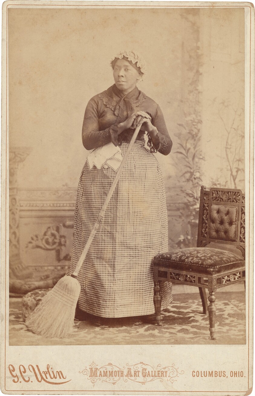 Portrait of a Woman with a Broom