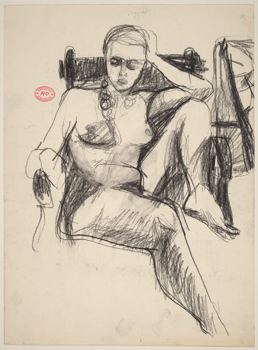 Untitled [female nude with left leg pulled into armchair]
