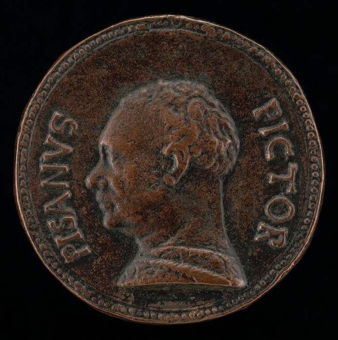The sculpture is a bas-relief medallion depicting the profile of a man's head. The man has curly hair and is facing left. His profile shows distinct features such as a pronounced nose and chin. Surrounding the profile are engraved inscriptions that read "PISANVS" on the left and "PICTOR" on the right. The medallion is circular and appears to be made of bronze. The surface of the sculpture shows signs of weathering, with some areas having a patina. The edge of the medallion is decorated with a repeated dotted pattern, framing the central image and inscriptions.