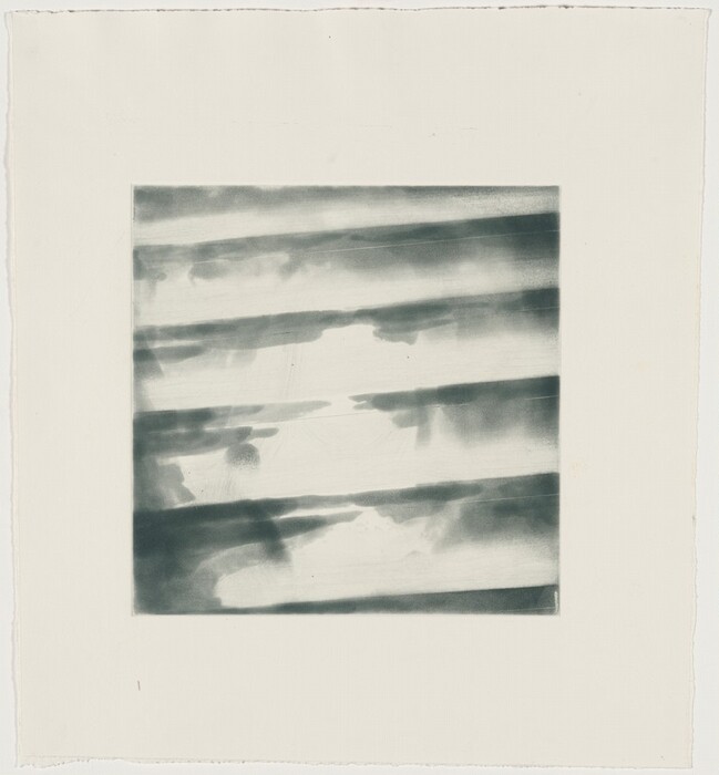 The image displays diagonal lines and shapes blending softly into one another to create an abstract composition. The tones are gray.