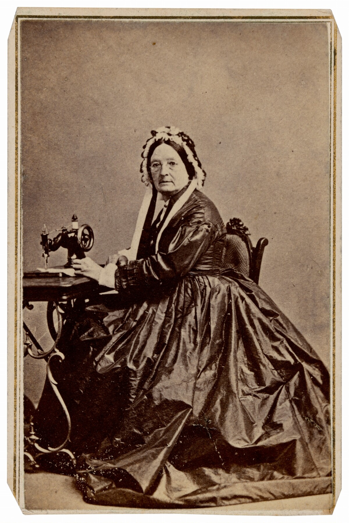Portrait of a Seamstress with Sewing Machine