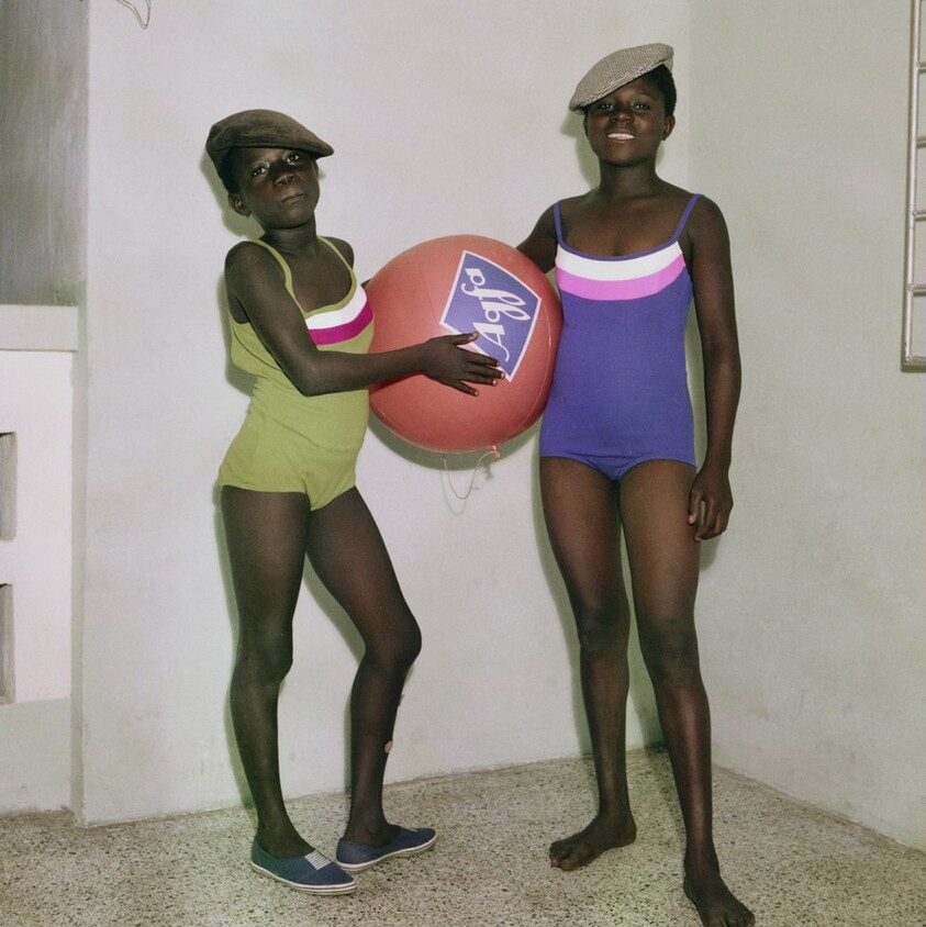 Untitled #7, Mavis and Mary Barnor with an Agfa advertising ball, Accra