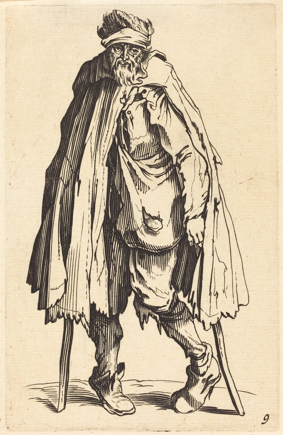 The image shows a man standing with a slight hunch, using a crutch under each arm for support. He has rugged facial features with a long, unkempt beard and bushy eyebrows. He has thick, disheveled hair and wears a headband or turban. His clothing is loose and tattered, including a long cloak, layered garment, patched pants, and worn shoes. The background is a plain surface.