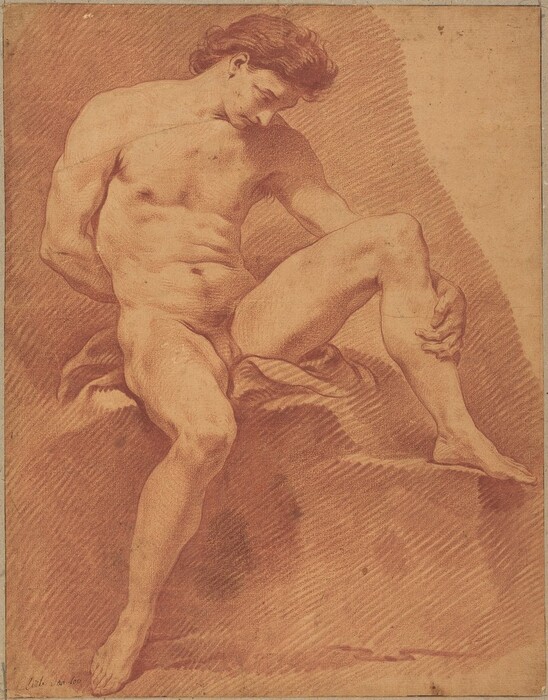 This drawing shows a full-body sketch of a male figure. He is seated, with one leg bent and resting on a ledge on the right and his other leg on the ground. His body is curved slightly inward, and his head is tilted downward as he looks to the right. The man has strong facial features with defined cheekbones, a prominent nose, and a full head of slightly wavy hair that falls back from his face. He is unclothed, revealing a well-defined, muscular physique. The man sits on what appears to be a draped cloth on top of undefined steps. The background is made of thin, diagonal lines. The drawing is done in red on tan paper.