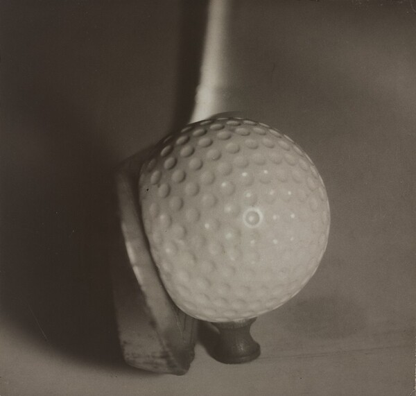 Teeing Off: Club Impacting Ball on Tee