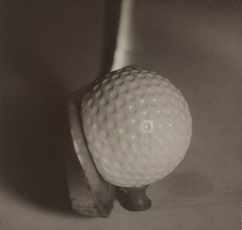 Teeing Off: Club Impacting Ball on Tee