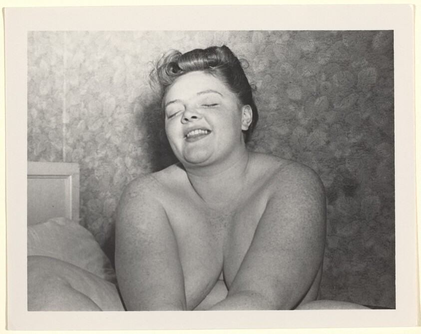 Untitled (Nude woman seated on bed with eyes closed)