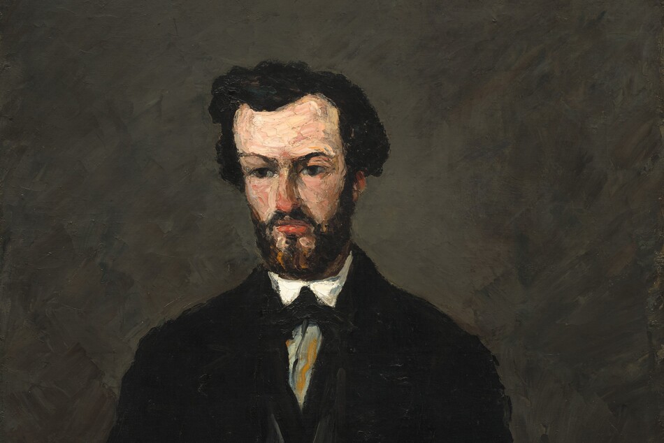 A light-skinned man with thick black hair and a squared off black beard, dressed in a black jacket over a gray vest and gray trousers, sits facing us in this vertical portrait painting. This work is loosely painted with visible brushstrokes so some details are difficult to make out. The man's body faces us but he looks down and to our left. The tip of his nose almost matches the coral red of his lips. Two pale peach patches below his mouth break up his beard on his pointed chin. His hands, closed into fists, rest on his thighs, which are cropped by the bottom of the canvas. He wears several layers of clothing. The open black jacket reveals a charcoal-gray vest with a V-shaped opening over another black garment, perhaps an undervest. This is worn over a white shirt, which is visible as bright traingles at this throat and white cuffs at his wrists. The white shirt seems to be tied with a black tie and possibly a gray cravat, but this area is broadly painted. The background is painted with gray strokes over black. The artist signed the painting in black paint in the lower right corner, though it is barely visible: “P. Cezanne.”