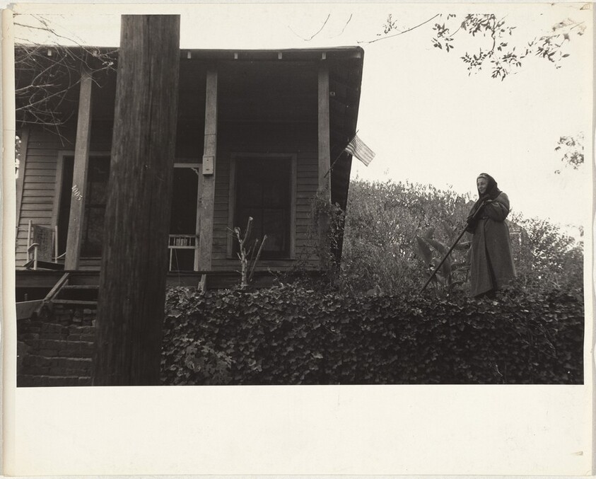 Woman near house--Louisiana