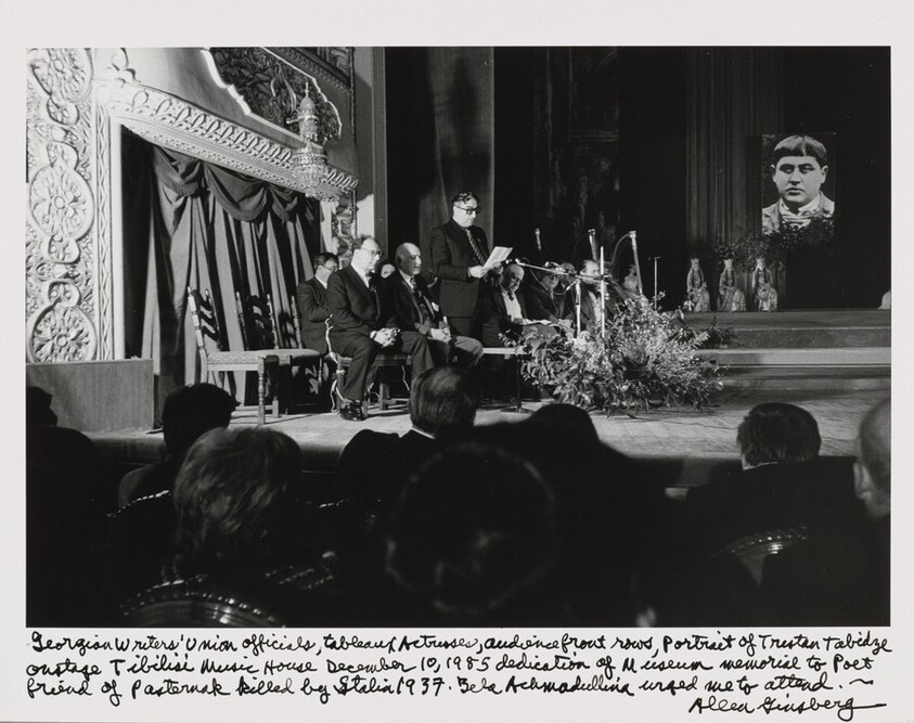 Georgian Writers' Union officials, tableaux actresses, audience front rows, Portrait of Titsian Tabidze onstage Tbilisi Music House December 10, 1985 dedication of Museum memorial to Poet friend of Pasternak killed by Stalin 1937. Bella Akhmadulina urged me to attend.
