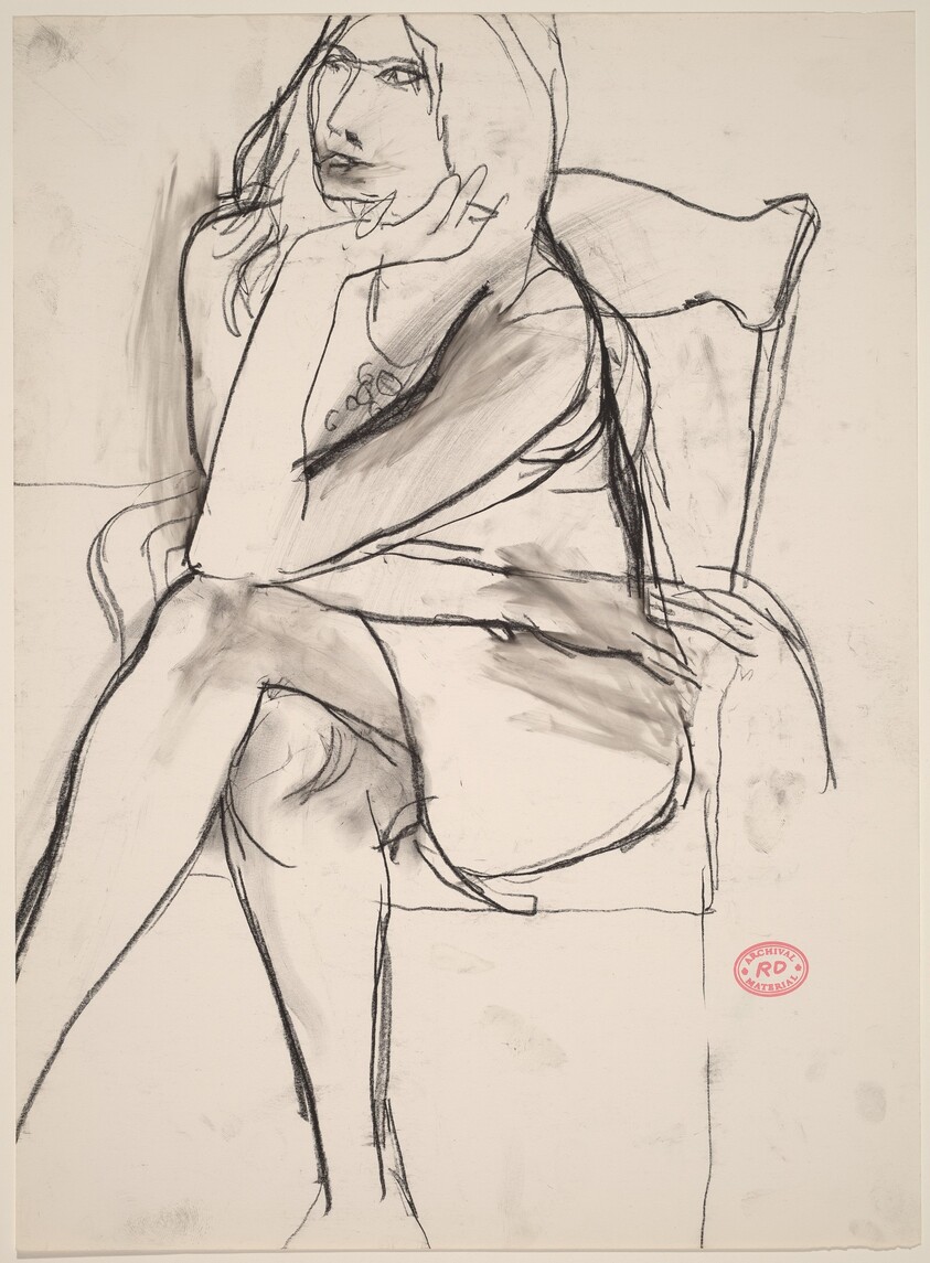 Untitled [seated woman crossing her legs]