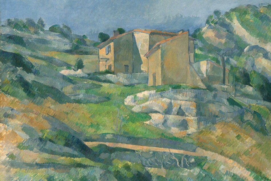 Pale beige, angular houses cluster at the center of the horizontal landscape painting. The hilly, rocky landscape around and below the houses is painted with cool blues and greens, and warm ivory and caramel brown beneath a pale blue sky. The artist applied the paint with regular, parallel, straight strokes.