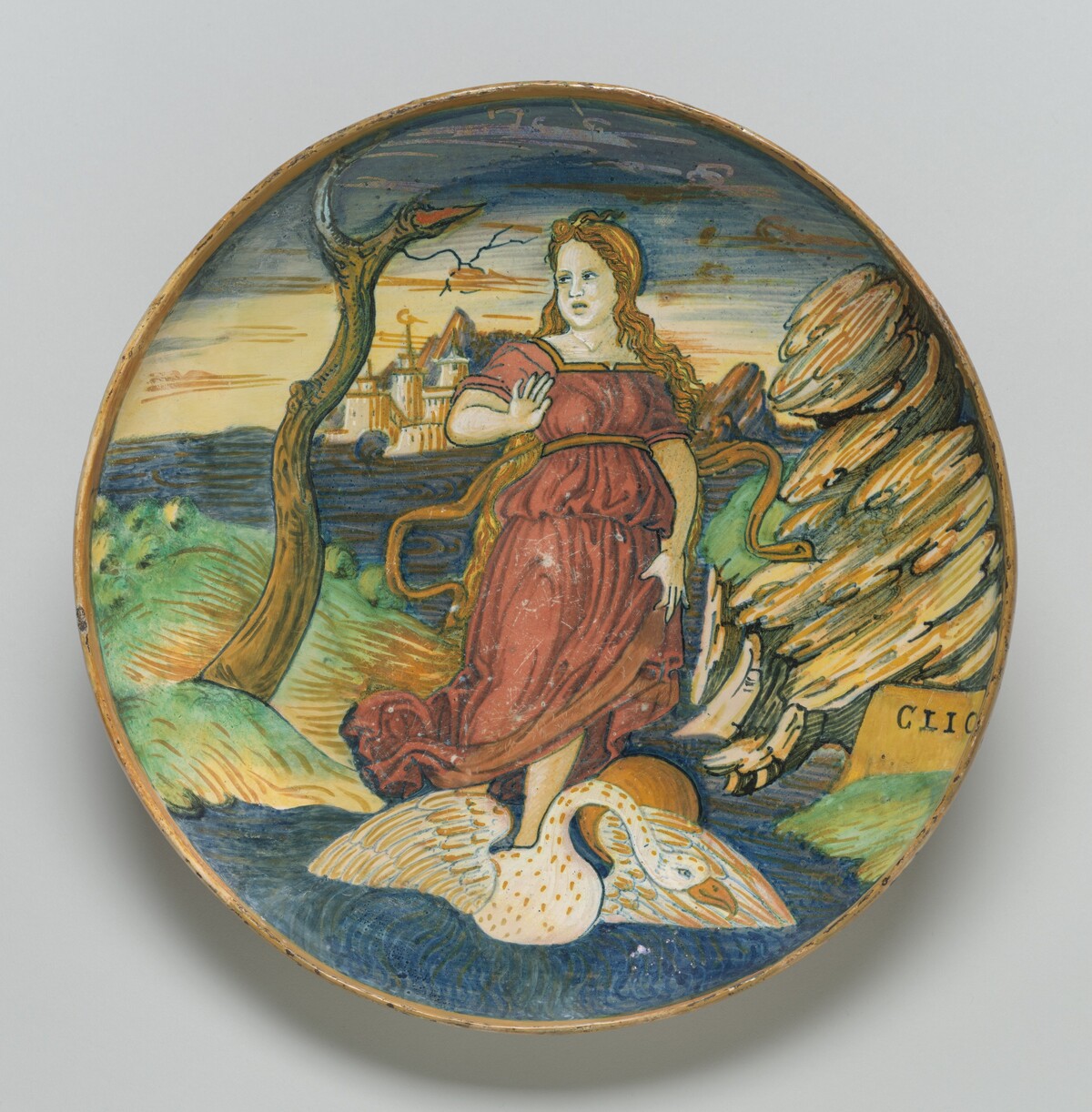 Shallow bowl on low foot with the muse Clio riding on a swan through a watery landscape
