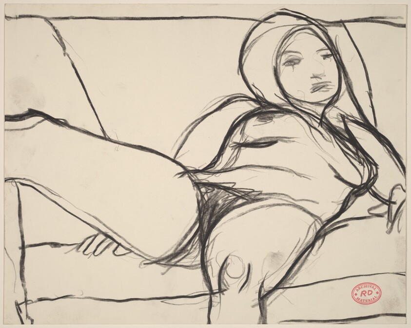 Untitled [female nude reclining on a sofa]