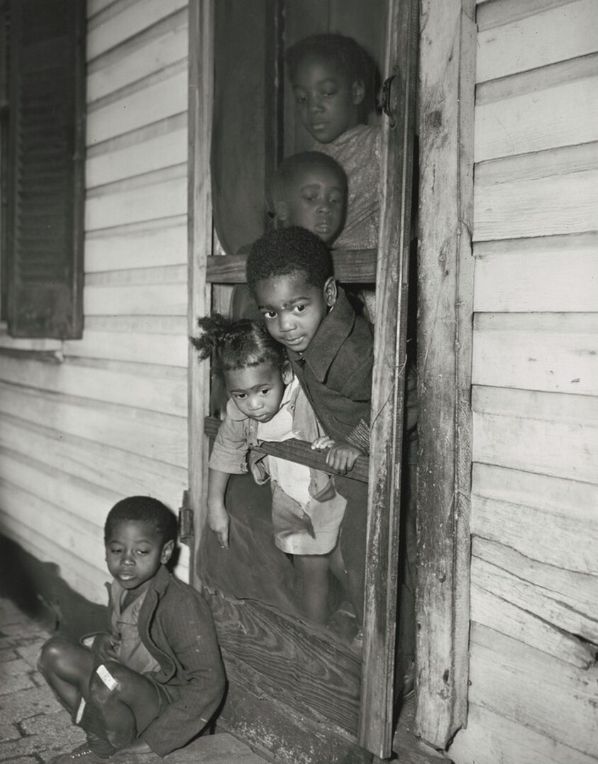 Washington (southwest section), D.C. Negro children in the front door of their home