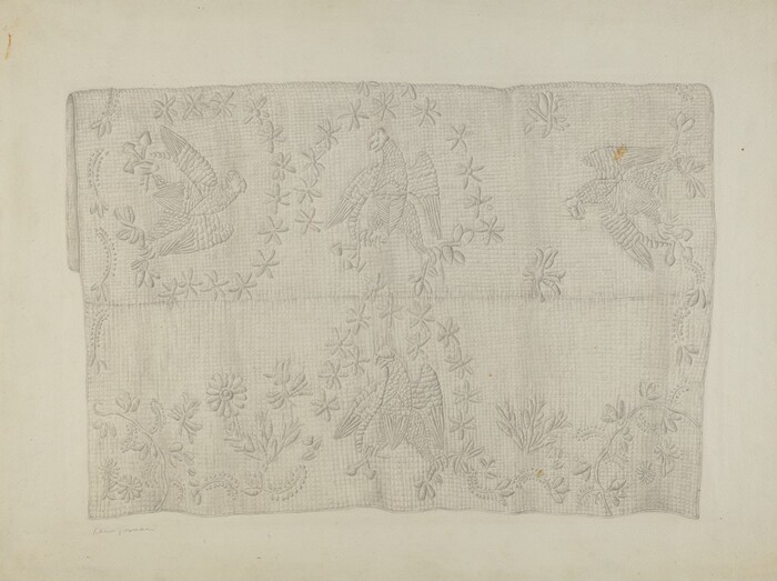 The image displays a textile with embroidered patterns. Three birds surrounded by floral motifs are the main focus. The color scheme is primarily gray and off-white. The textile fills most of the image, with the birds and floral designs symmetrically arranged across it.