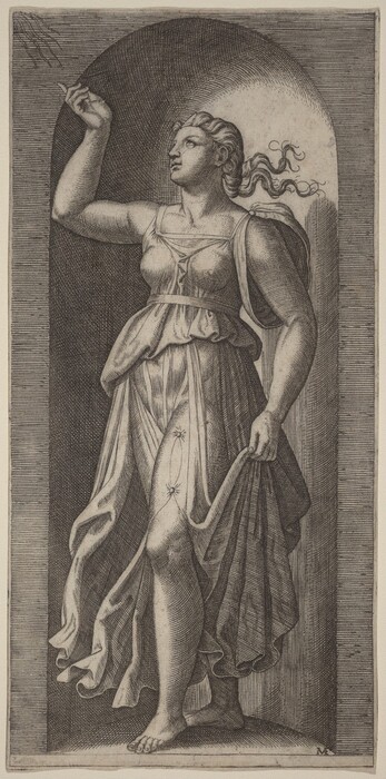 The image shows a person standing with their body slightly turned to the side. The person's head is raised, with a focused gaze, and they have pronounced facial features. Their hair is styled in waves, flowing down to the shoulders, with strands gathered behind the head. The person wears a draped garment cinched at the waist, revealing their form. They are barefoot, with one foot placed slightly ahead of the other. The figure holds an object in their left hand and touches the edge of the dress with their right hand. In the background, there is an arched niche with a vertical line pattern.