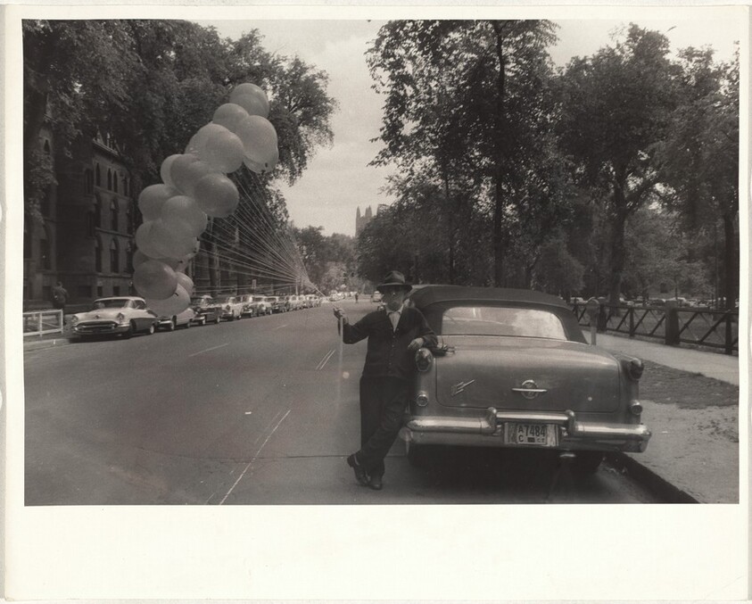 Man on street with balloons--Yale University, New Haven, Connecticut