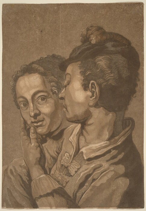The image depicts a close-up of two individuals facing each other. The person on the left is looking forward with defined facial features and curly hair. The individual on the right is in profile, with features including a strong nose and styled hair. Both are wearing garments with voluminous collars, and the right person's hand is touching the left person's chin. The background is a neutral brown tone.